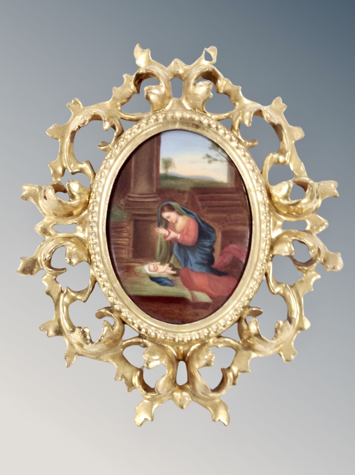 19th century Italian School : The Madonna and Child, oil on porcelain oval plaque, 14 cm x 10.