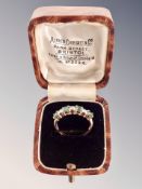 A 9ct gold diamond half eternity ring