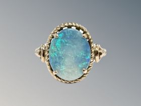 A 14ct yellow gold opal doublet ring, size N.