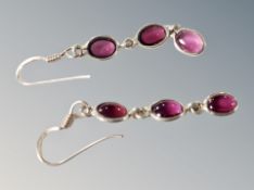 A pair of silver stone set earrings