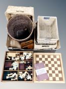 A chess board containing chess pieces, letter rack,