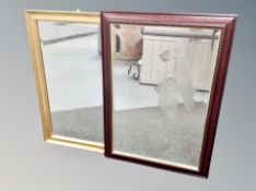 A gilt framed mirror and an etched framed mirror