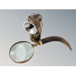 A late 19th century brass bicycle lamp together with a magnifying glass with carved horn handle