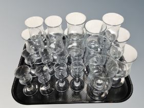 A quantity of Scandinavian drinking glasses