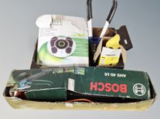 A box of Bosch hedge trimmer, garden shears,