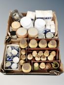 Two boxes of Danish glazed earthenware, kitchen pots on wooden racks, ramekins,
