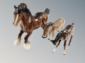 A Beswick brown gloss cantering shire horse, height 21 cm,