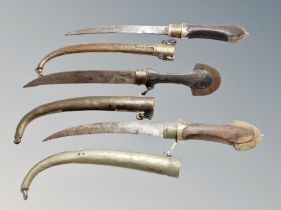 Three Arab Jambiya knives in sheaths