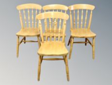 Four contemporary pine dining chairs