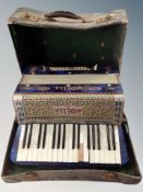 A Midella piano accordian in carry case