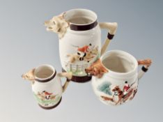 A graduated set of three fox hunting theme jugs,