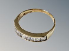 A 9ct gold half eternity ring