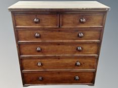 A Victorian mahogany six drawer chest,