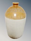 A glazed stoneware flaggon signed John Fitzgerald Wine and Spirit Merchant Newcastle and