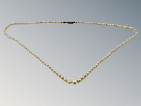 A graduated cultured pearl necklace with yellow gold clasp and a collection of costume jewellery