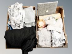 Two boxes of woolen jumpers, linen, candle,