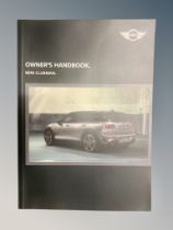 Ten Mini Clubman Driver's Manuals/Owner Booklets in Original Wallets.