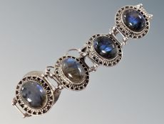 A silver stone set bracelet