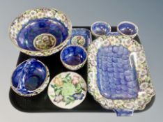 Seven pieces of Maling blue lustre china and a further ashtray