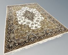 A carpet of Persian Kirman design,