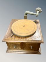 An oak table gramophone