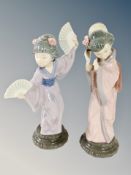 Two Lladro figures of geisha girls holding hand fans,