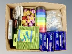 A box of adhesive drill guides, outdoor clothes lines, magnetic wrist band,