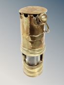 A brass miner's lamp