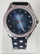 Brand new lady's Floozy watch, 4cm face, with protective film cover.