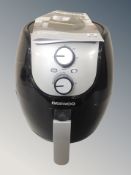 A Daewoo four litre air fryer with instructions
