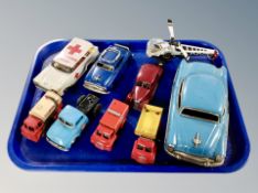 A group of vintage tin plated wind-up vehicles, cars,