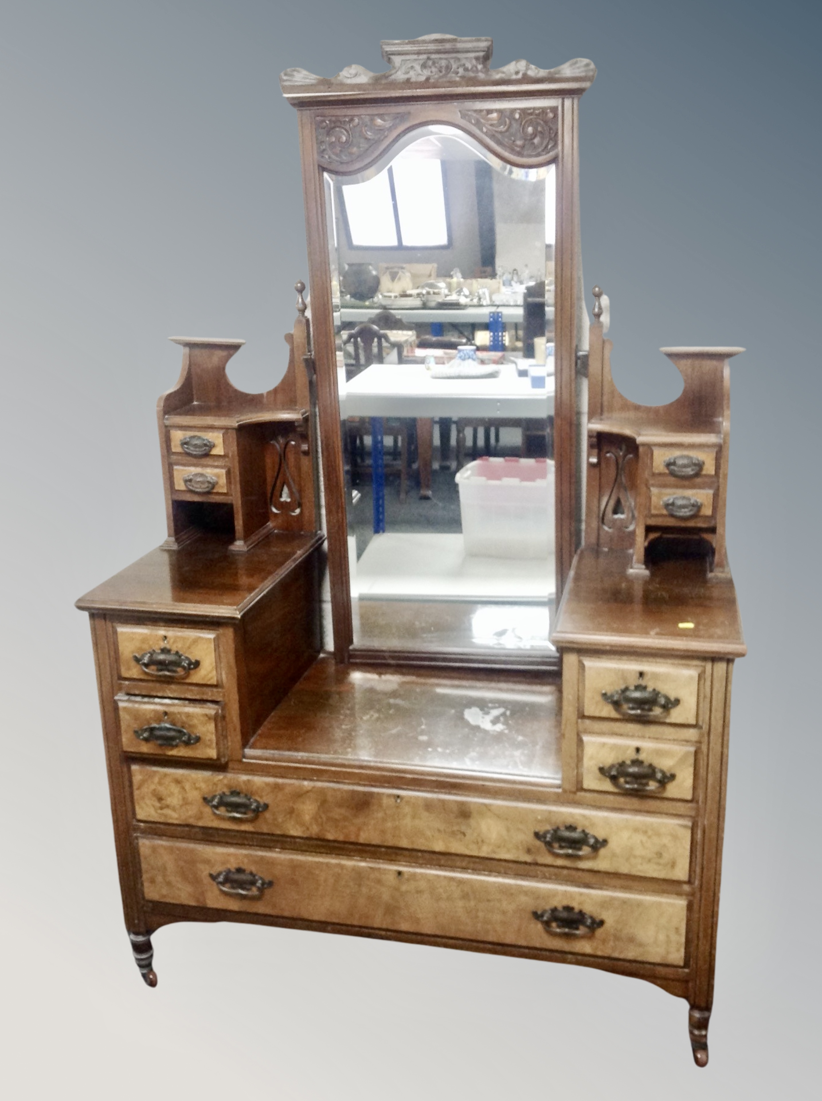 A late Victorian walnut sunk centred dressing table,