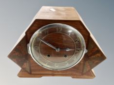 A teak cased eight day mantel clock and further Bakelite Enfield clock