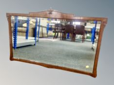 An early 20th century mahogany framed overmantel mirror,
