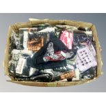 A box of over 100 face snoods depicting various characters