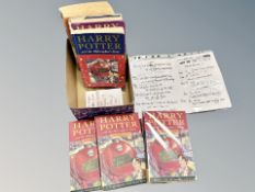 A group of early Harry Potter volumes including Philosopher's Stone with printing errors.