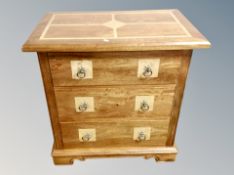 A Barker & Stonehouse Flagstone three drawer chest,