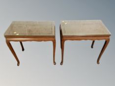 A pair of reproduction mahogany lamp tables on cabriole legs with plate glass tops,