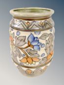 A Charlotte Rhead Crown Ducal ribbed vase with tube lined decoration,
