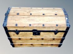 An oak metal bound dome topped chest,