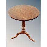 A Georgian style oak tripod table,