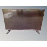 A Luxor 32 inch LCD TV with lead,
