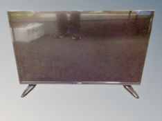 A Luxor 32 inch LCD TV with lead,