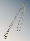 A 9ct gold Mackintosh collection pendant suspended on 9ct gold chain, 4.7g.