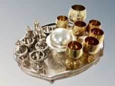 A silver plated gallery tray together with a set of six brass goblets,