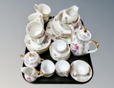 A 20th century Polish porcelain tea set and one further foreign hand painted tea set