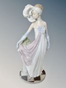A Lladro figure Socialite of the 20's number 5283 (a/f) CONDITION REPORT: Loss to