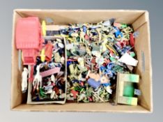 A quantity of die cast and plastic soldier figures, cars,