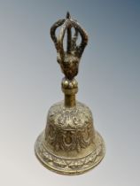 A 19th century Tibetan brass Vajra bell, height 16cm.