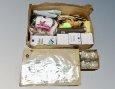 Several boxes of pin badges, soft toy key rings, Kazoos,